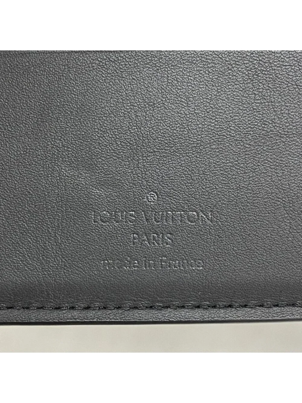 Louis Vuitton our materials tag